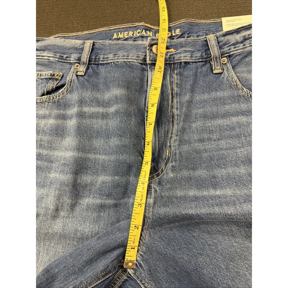 New American Eagle Dreamy Low-Rise Baggy Flare Simply Dark Raw Hem Jean 18 34W - Picture 3 of 9
